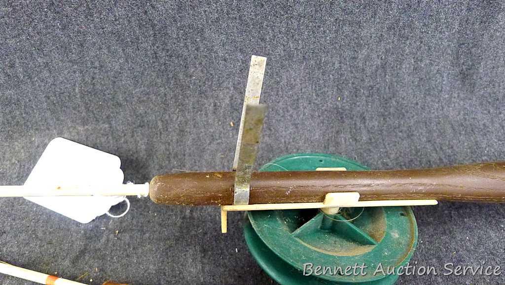 Three vintage ice fishing rods. Longest is 34.