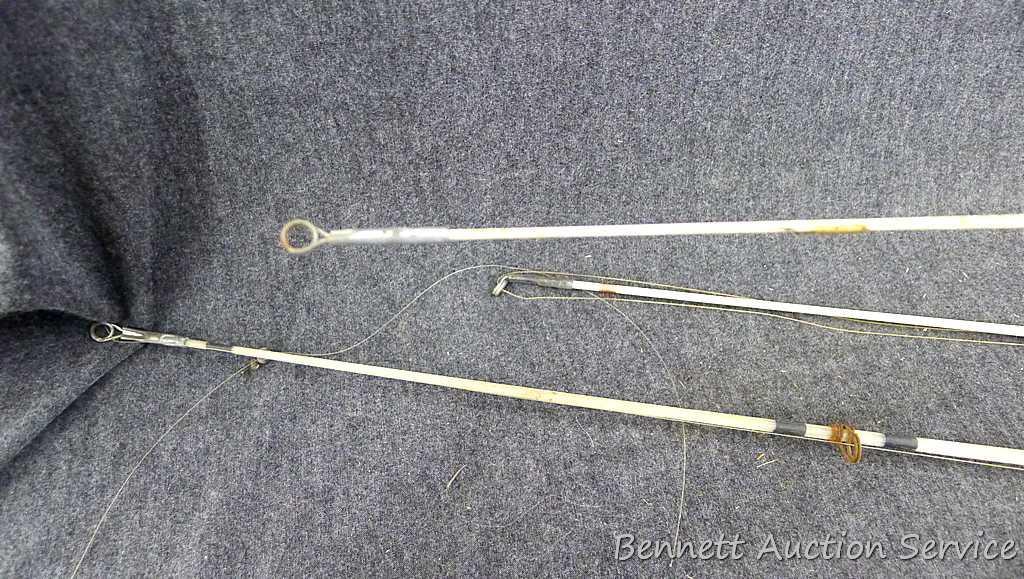 Three vintage ice fishing rods. Longest is 34.