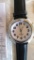 Talking Atomic watch with leather band. Clock face is 1-1/4