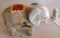 Antique metal wind-up elephant covered in cloth is 3-1/2