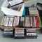 Large collection of cassette tapes. See pictures for titles.