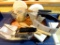 Pampered Chef pizza stone with rack, wooden spoons, 4 cup batter bowls with lids, pie slice/server,
