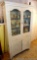 Very charming cabinet with glass doors on top, the drawers and paneled doors have a pressed design