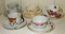 Collection of 5 different teacups and their matching saucers.
