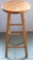 Wooden swivel stool is 29