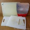 Two large plastic cutting boards, one glass cutting board is 12