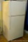 Whirlpool Model ET18GK refrigerator with freezer. Stands 65