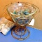 Bent wire stand currently holds a dish of pretty polished rocks, but could easily display a small