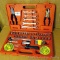 Handy household tool kit with combination wrenches, plyers, sockets, more. Case measures 15