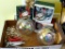 Two large iridescent glass ornaments are each 5-1/2
