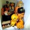Halloween and fall decorations including lighted pumpkins, wall hangings, plastic cauldron, acrylic