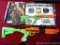 The Walking Dead Battleground video game plugs into a TV. Comes with original box.