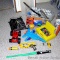Tub of toys includes some K'Nex; Nerf rifle; set of 4 water Blasters; ceramic military dressed piggy