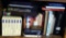 Shelf of books with a variety of subjects including health and healing, Jenny Craig including VHS's,