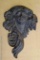 Cast metal wall hanging; measures 8