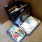 Grand Pack-N-Roll portable cart filled with picture frames and nature photos; cart opened up