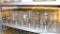 Twenty eight Kerr narrow mouth quart canning jars.