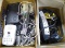 Power strip, cordless phone, answering machines, assorted cables, cords antenna and more.