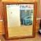Antique wood framed mirror has some silvering missing, measures approx. 27