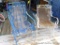 Two springy patio chairs match the glider rocker in lot 782. Larger chair is 22