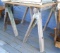 Pair of wooden saw horses, both about 40