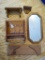 Several wall hanging wooden shelf units; wooden framed wall mirror is 11