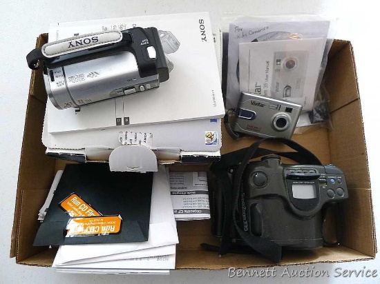 Olympus Infinity SuperZoom 330 camera has manual; Sony Handycam model DCR-SX44, comes with original