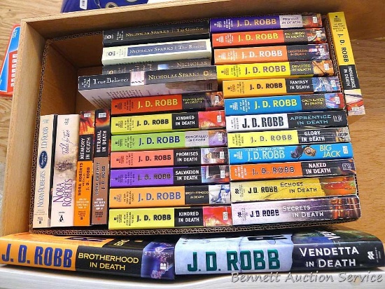 Box of books by author Nora Roberts, Nora Roberts writing as J.D. Robb and lots of J.D. Robb.