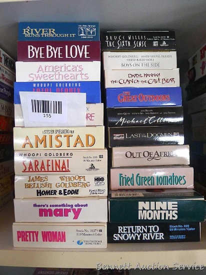 Stack of VHS movies including Fried Green Tomatoes, Return to Snowy River, Nine Months, Pretty