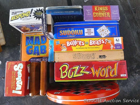 Box of games includes Mad Gab, Buzz Word, Sudoku, Kings in the Corner, SpellDown, Snorta, Respond,