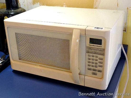 Hamilton Beach microwave; measures 21" x 15" x 12". Heats up food nicely.