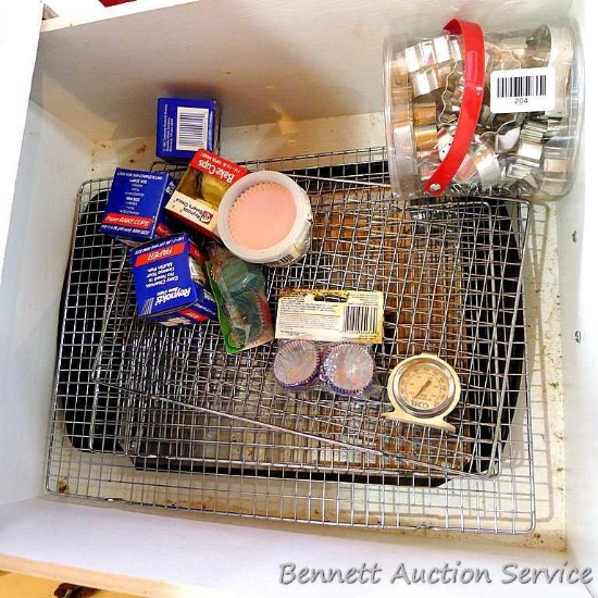 Cooling racks, cookie sheets, cookie cutters and muffin papers; largest cooling rack measures