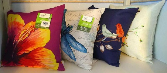 Four Mainstays Outdoor square pillows 16" x 5". All are new with tags still attached.