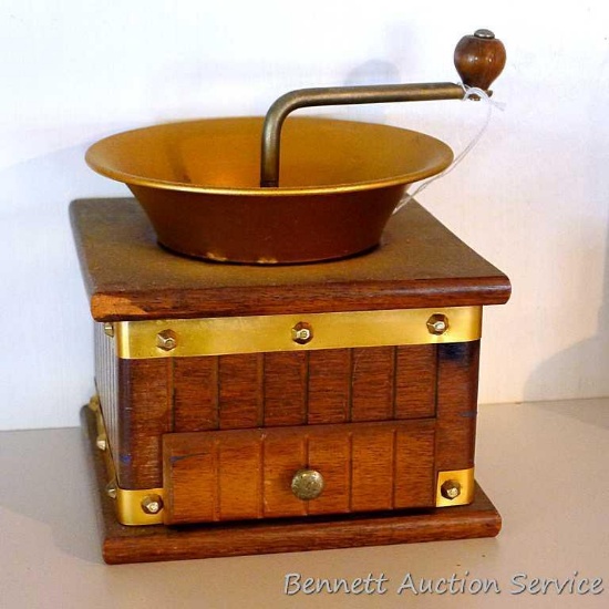 Retro coffee grinder has copper toned accents and measures 6-1/2" square x 7-1/2" high.