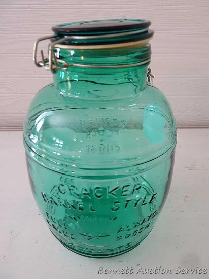 Cracker Barrel Style 4 quart green glass jar with snap on lid and rubber seal. Jar measures 11"