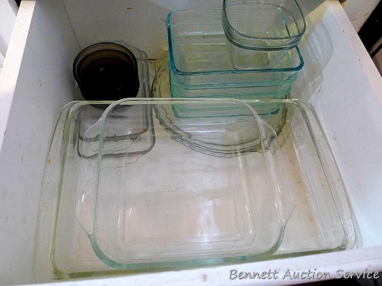 Nice assortment of glass baking pans including 9x13, 8x8, loaf pans, pie plate, more.