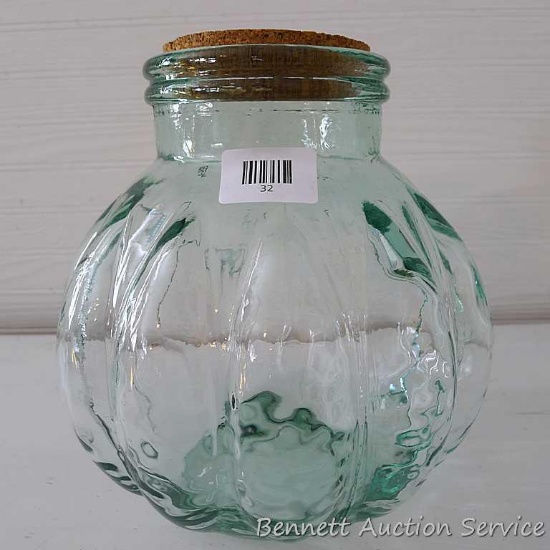 Large green glass canister jar is 11" tall x 10" diameter.