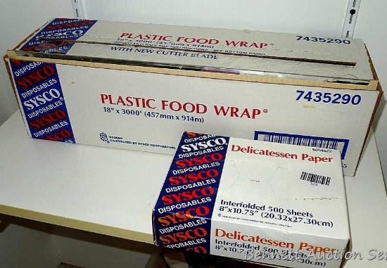 Sysco plastic food wrap 18" wide x 3000' and looks to be almost full, Sysco delicatessen paper with