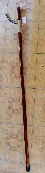 Walking stick is 55" tall, sturdy and in good shape.
