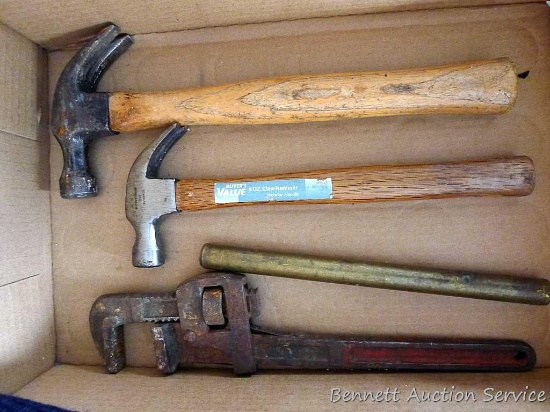 12" and 13" claw hammers -heads are 4" and 5"; 3/4" brass rod is 9-3/4"; 12" pipe wrench.