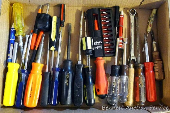 Assorted screwdrivers and nut drivers. Brands include Craftsman, Stanley and others.