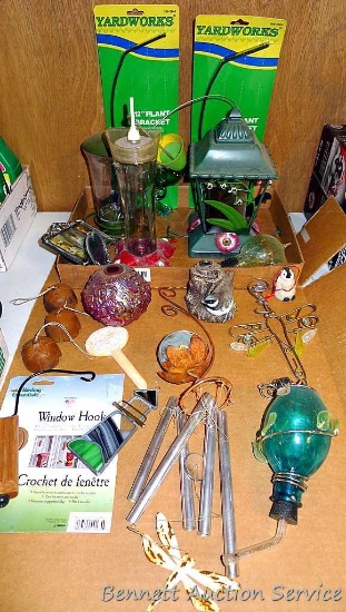 Yard & garden decorations including bird feeders, hummingbird feeder, wind chimes, 12" plant