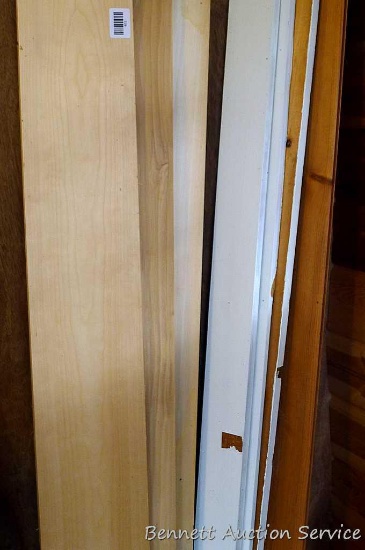 Three 1x8 boards, longest is 6-1/2'. One piece of car siding, three painted trim boards.