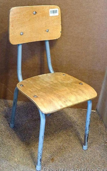Cute little child's school chair is sturdy and in good condition.