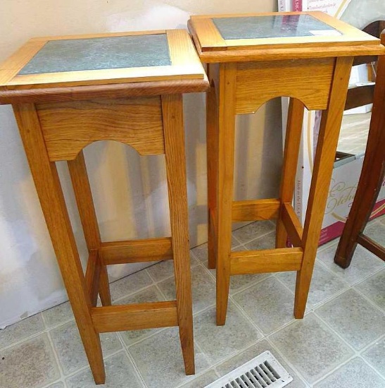 Pair of wooden stools with tile insert in seat. Stools are 27" tall.