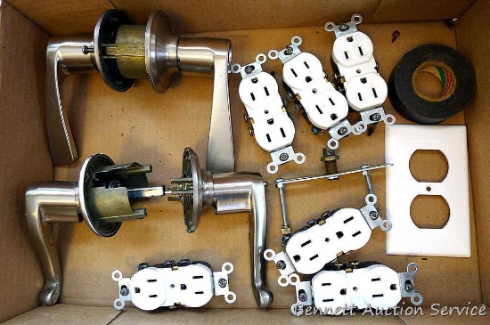 Two lever style door handles are lockable, but no keys included. Six outlets, some electrical tape,