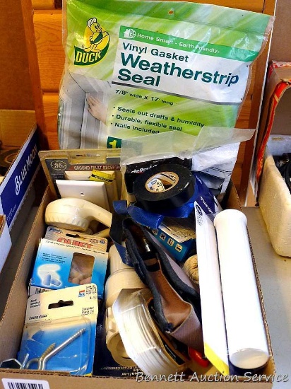 Household handyman items including window insulation kit, weather strip kit, electrical tape,