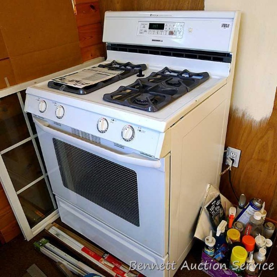 Maytag Super Capacity Plus 30" convection stove. Range is currently plugged in and clock display