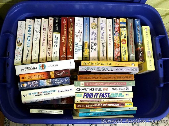 73 quart tote filled with assorted paperback novels. Authors include LaVyrle Spencer, Robyn Carr,