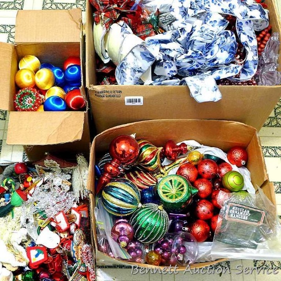 Christmas tree trimmings including ornaments of all kinds and sizes, bows, beads, ribbon and more.